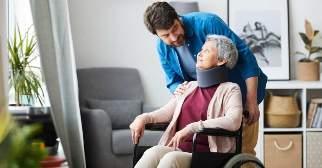 Paid Family Caregiver in Ohio assisting an elderly woman in a wheelchair at home with care and support.